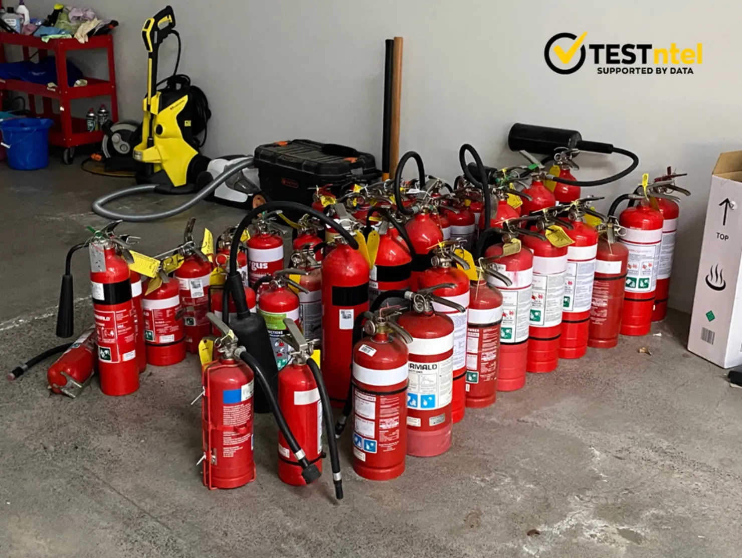 Faulty &amp; Expired Fire Extinguishers at TESTntel Warehouse Awaiting Disposal 